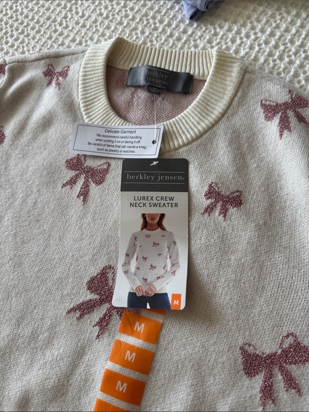 Berkley Jensen Cream Lurex Crew Neck Sweater with Pink Bow Pattern